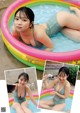 A woman in a bathing suit is sitting in an inflatable pool.