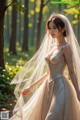 A woman in a wedding dress standing in the woods.